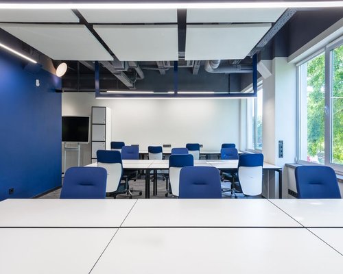 A bright modern meeting room in Budapest used for organizing the webinars